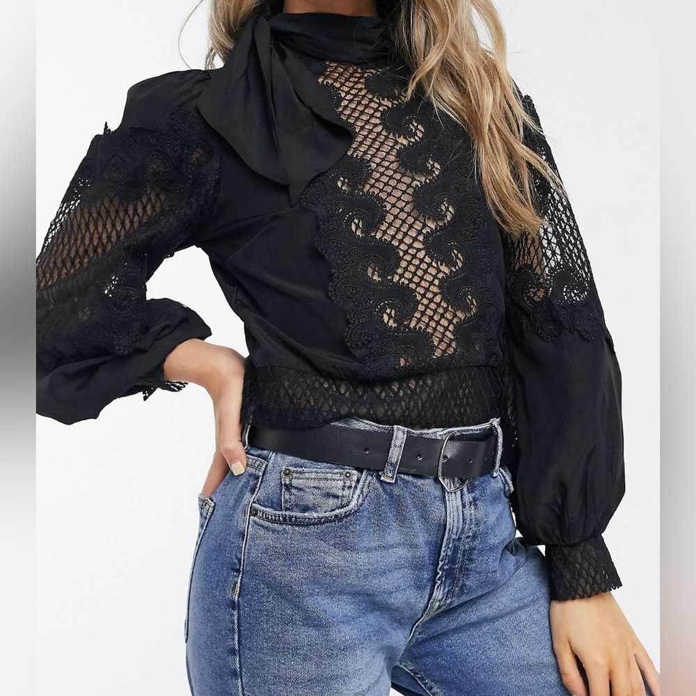 Black lace blouse. Never worn.